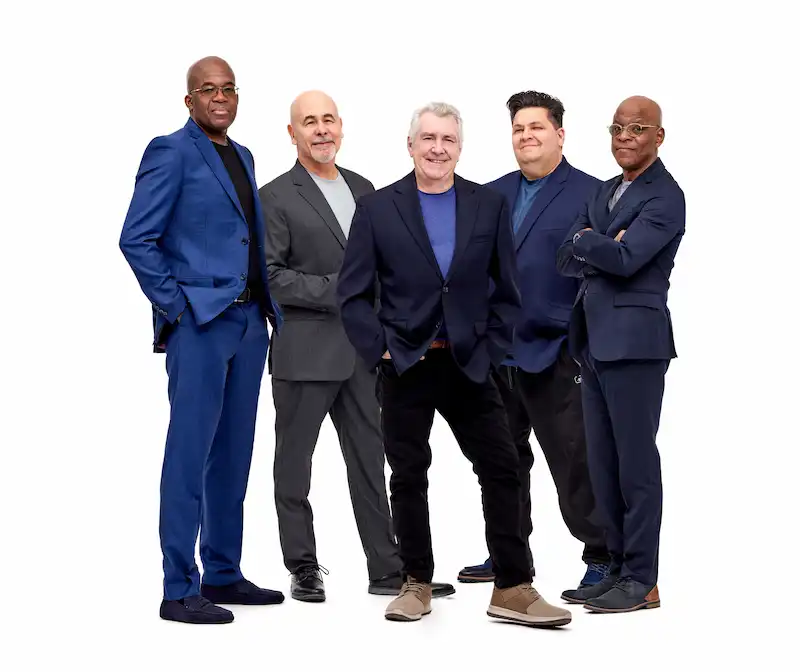 The group Sypro Gyra posing